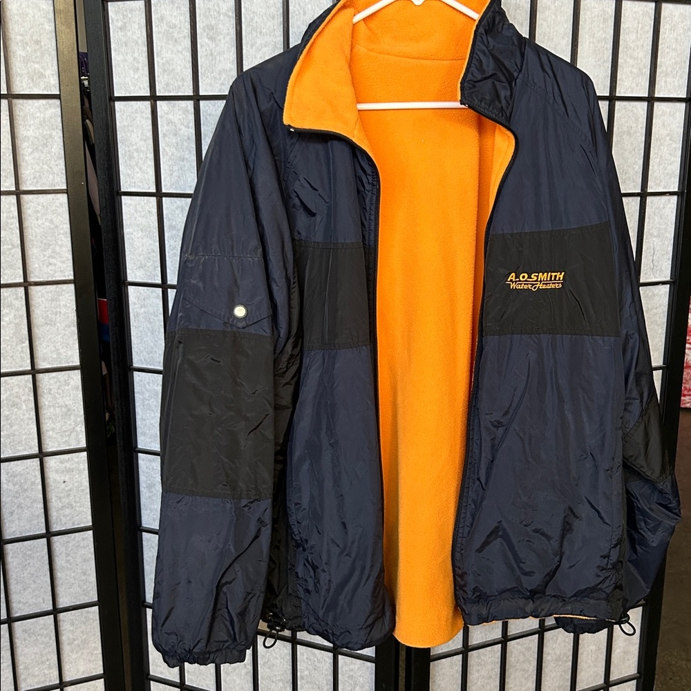 A.O. Smith reversible Navy and Yellow Jacket